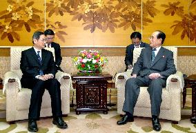 China's Zhang, N. Korea's Kim Yong Nam meet