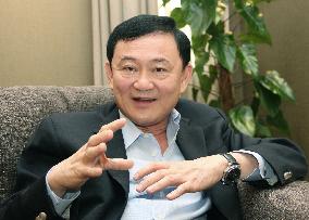 Thaksin calls for reconciliation