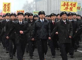 Young N. Koreans march