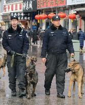 Chinese police disperse street protesters