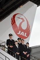 JAL plane with revived red crane logo