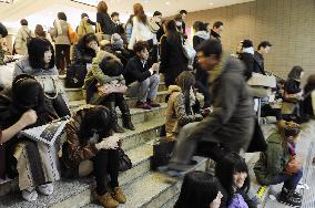 Stranded passengers in Shinjuku Station