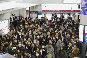 Tokyo area railway service disrupted over power outage plan