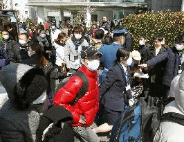 Foreigners leaving Japan