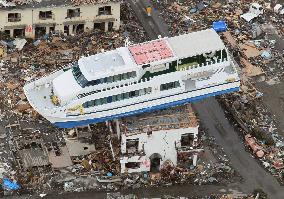 Ship on building after tsunami