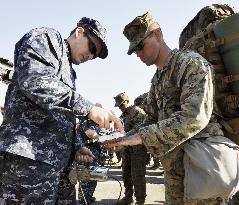 U.S. military relief team leaves Oshima island