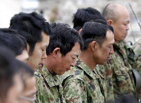 Japan mourns on 1 month anniv.