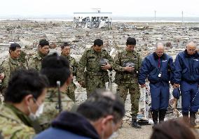 Japan mourns on 1 month anniv.