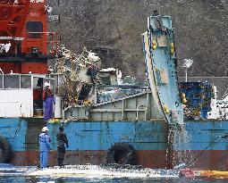 Boat salvaged at tsunami-hit Yamada port