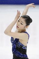 Kim finishes first in short program