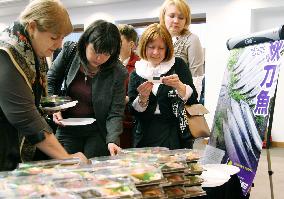 Japan embassy serves saury from disaster area to Russians