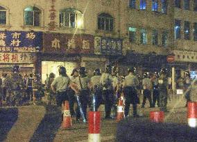 Chinese police maintain heavy security in Guangdong