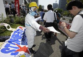 Protest at utility firm shareholders' meeting