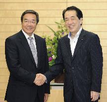 PM Kan meets next IMO chief Sekimizu