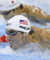 Phelps advances to 200 butterfly semis at worlds