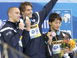 Medalists in men's 100 backstroke at worlds