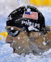 Phelps wins 100 butterfly