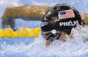 Phelps wins 100 butterfly