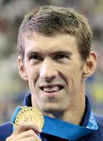 Phelps wins 100 butterfly