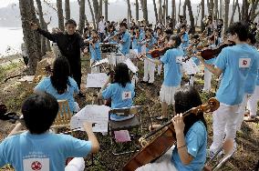 Children's orchestra mourns disaster victims