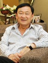 Thaksin to visit Japan