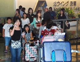 Holidaymakers returning from abroad peak at Narita