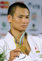 Ebinuma strikes gold at world judo c'ships