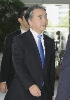Reappointed reconstruction minister Hirano
