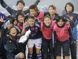 Japan women qualify for Olympics soccer in top spot