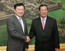 Fugitive ex-Thai premier holds talks with Cambodia's Hun Sen