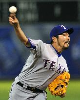 Rangers' Uehara gets 2nd win of season