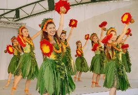 'Hula girls' greet guests at Fukushima spa resort reopening