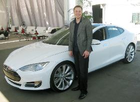Tesla to make EV at new plant