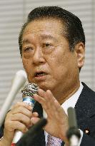 Ozawa speaks at press conference