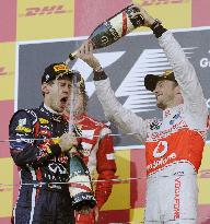 Vettel wins consecutive world titles
