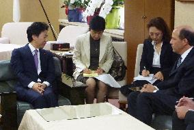 Finance Minister Azumi, U.S. envoy Roos hold talks