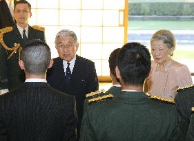 Emperor, empress thank defense force members back from U.N. missions