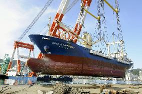 Removing ship after tsunami