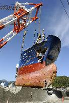 Removing ship after tsunami