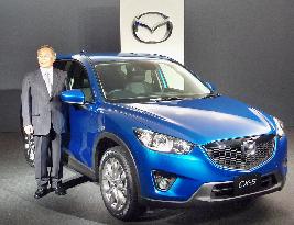 Mazda unveils SUV with clean diesel engine