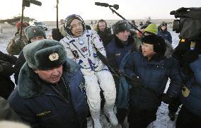 Astronauts return to Earth