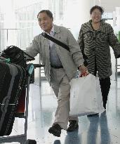 War-displaced man departs Japan