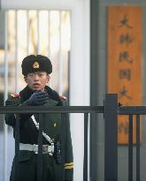 Police officer at S. Korean Embassy in Beijing
