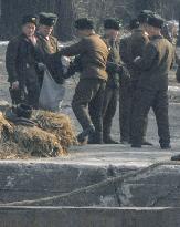 N. Korean soldiers at a dock