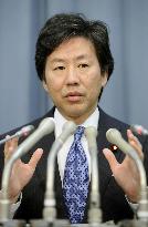 Finance minister Azumi at press conference