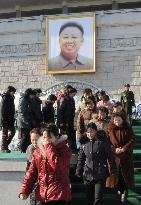 Mourners visit Kim Jong Il portrait