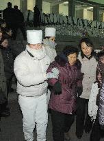 Condolence visit to Kim Jong Il in cold