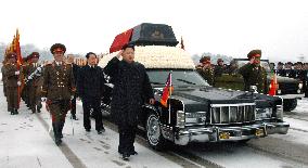Kim Jong Un with father's hearse