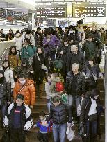 Rush of travelers returning from New Year holidays