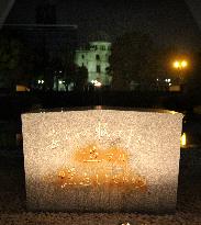 Cenotaph at Hiroshima peace park sprayed with golden paint